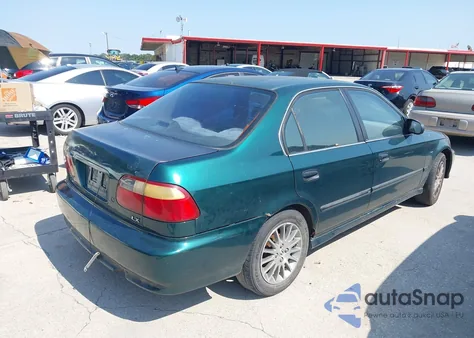 1999 Honda Civic Lx z USA, uszkodzony, nr VIN 2HGEJ6574XH504778